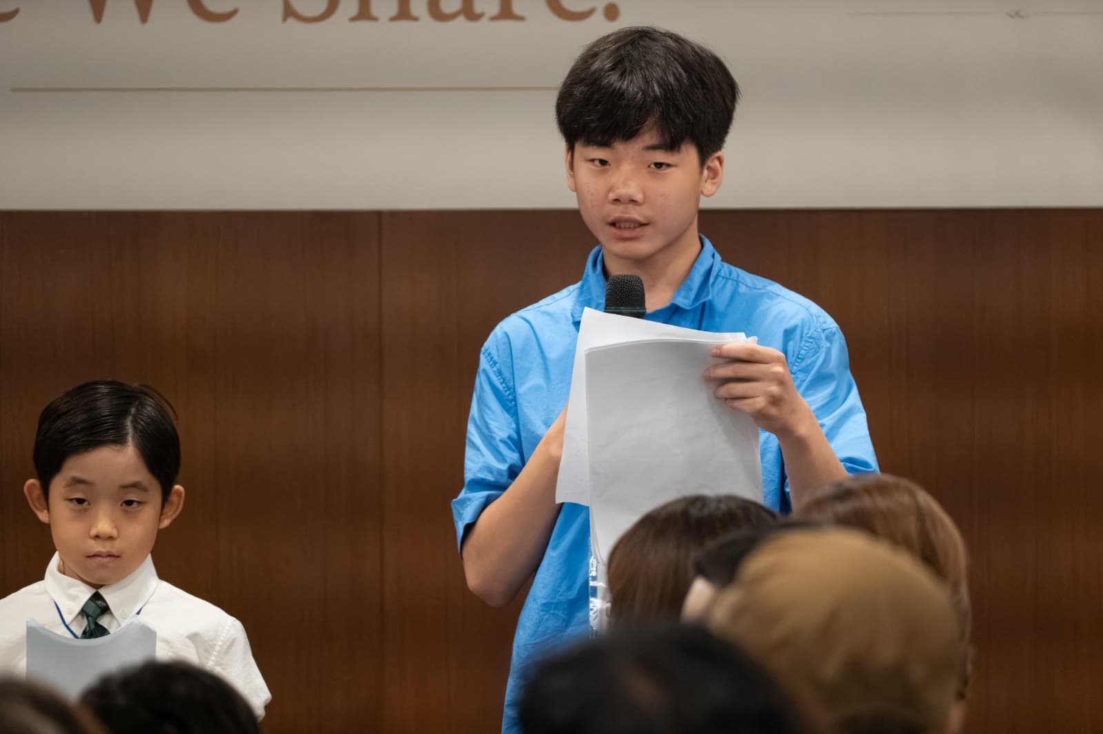 Youth presenting on stage